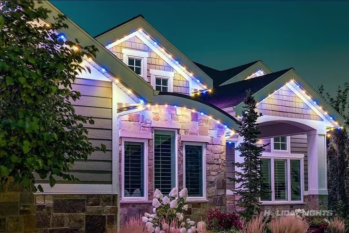App-controlled permanent LED lighting on a Rhode Island home facade
